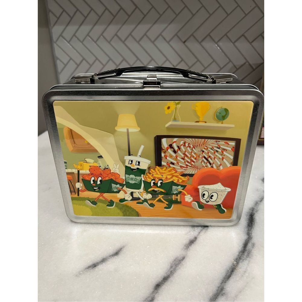Wing-stop lunch box with drink flask.